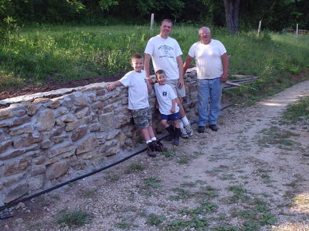 After building a rock wall.  Byron and two nephews, Alex and Ryan.