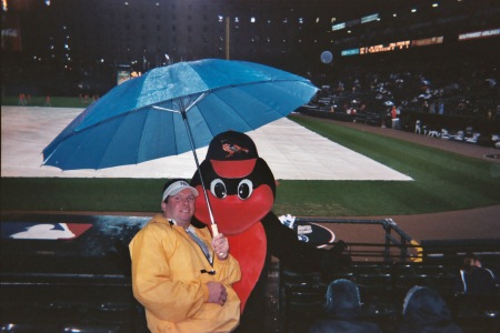 with Orioles mascot during a Yankees/O's game