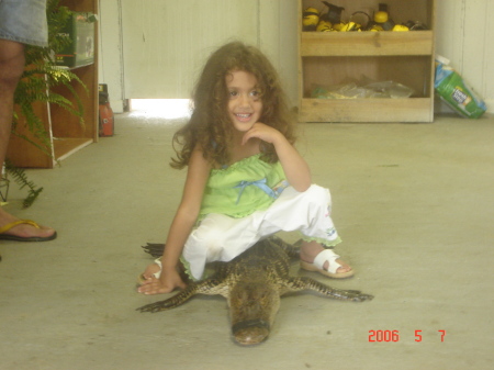Taylor and her pet alligator.  YES IT'S REAL.