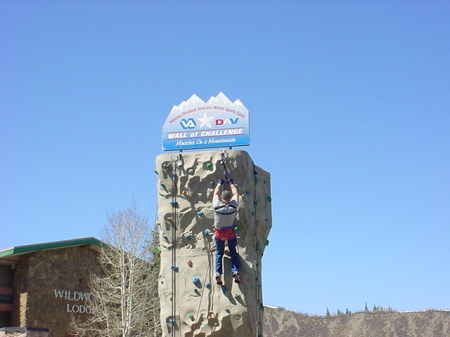 Climbing rock wall during Winter Clinic 2004
