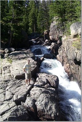 Me at a hidden waterfall- beartooth pass, montana
