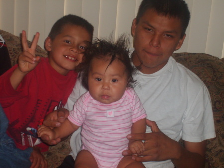 My son Michael, my grandaughter, and her father.