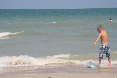 Spencer skimboarding