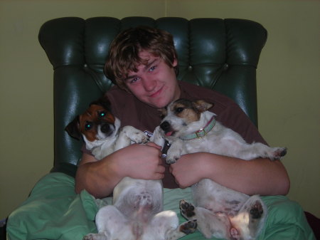 Logan, our second son, with the puppies