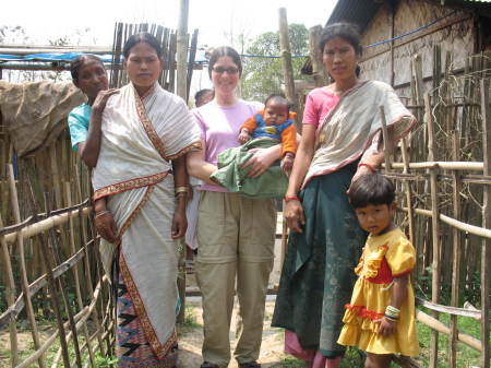 Sue with newborn and village neighbors 2008