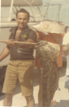 GEORGE WITH GROUPER HE SHOT