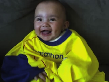 Remy Cheering w/ daddy.. Go Ecuador!