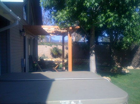 Spa and Flagstone Patio with Trellis