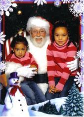 Kiya (2) and Zoe (5) with Santa 2006