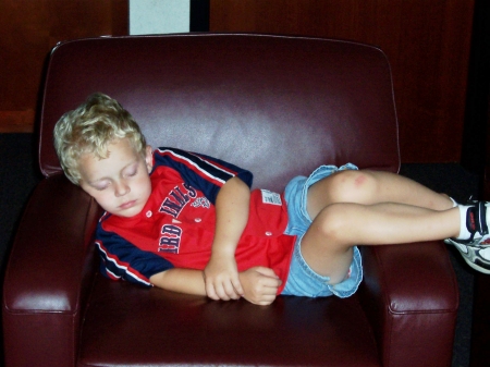 My son Austin sleeping at the Rockies vs Cardinals in Denver, CO.