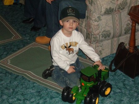  Brandon & his favorite thing ever...a tractor!