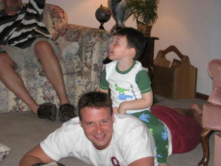 Logan abusing the back of uncle Scott