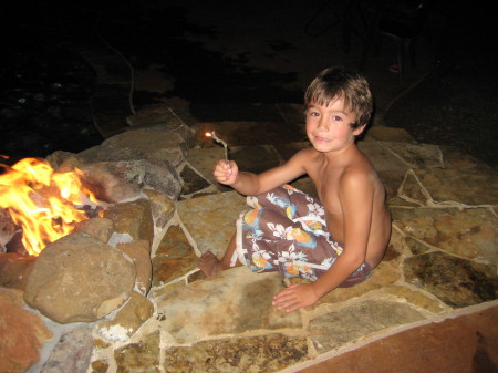 Logan roasting by the pool