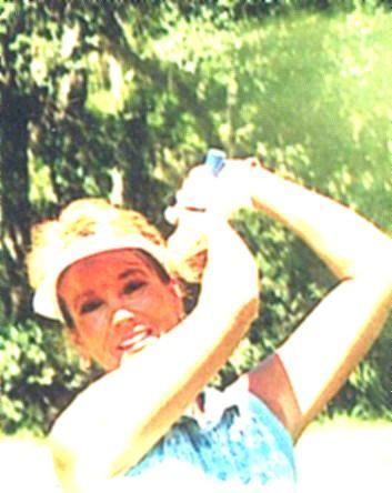 Carol golfing