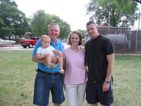 Me with granddaughter, daughter & son-in-law