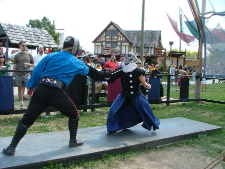 My daughter fencing at the Bristol Renaissance Faire 2006