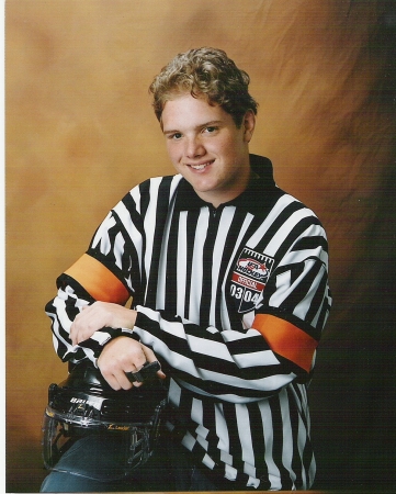 Alex in his hockey referee outfit...