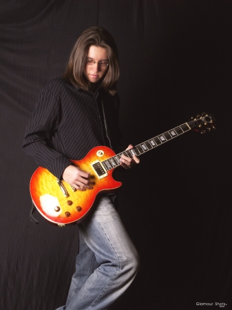 My Son Jonathan and his guitar at 19 yrs old