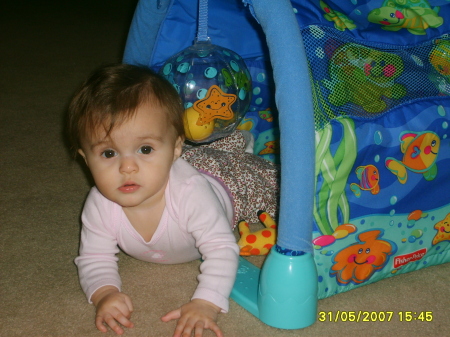 Lillian crawling in the tunnel