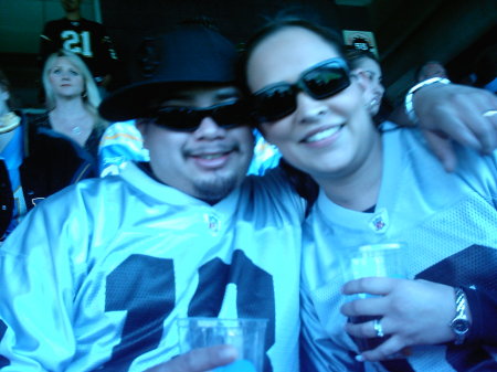 MY HUSBAND AND ME AT A RAIDER& CHARGER GAME