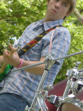 Alex playing guitar