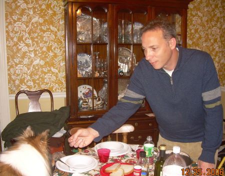 Long-time friend Steve Costantino feeding my son 2006