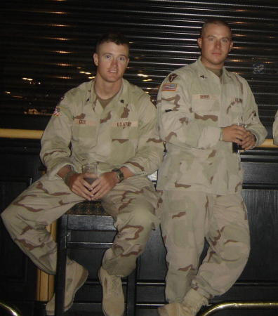 Brady (standing) and friend, Byron while serving in Iraq.  I lost Brady in Iraq on October 3, 2005.