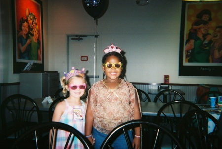 My daughter Courtney and my Neice Danielle at chuckie cheese