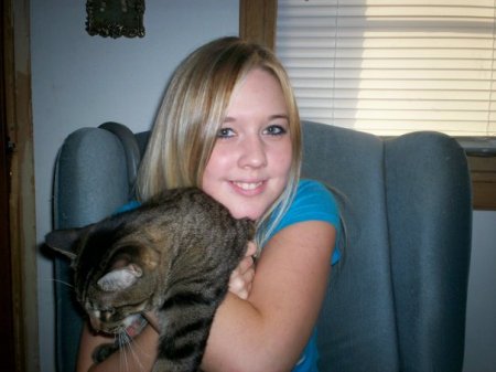 My daughter "Kim", with her tabby cat