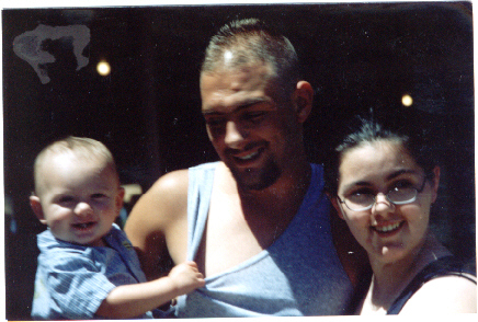 Grandson Ty, with Keith and Nikki, my daughter