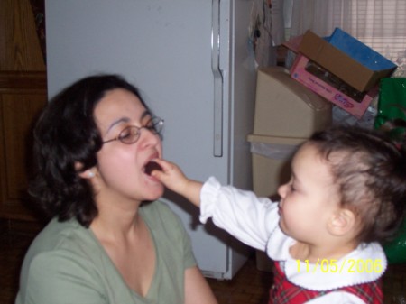 Sofie feeds mommy