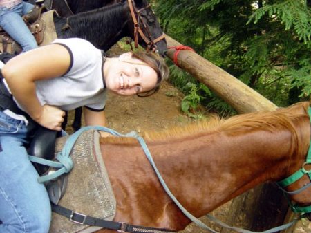 Trying to pose with a horse