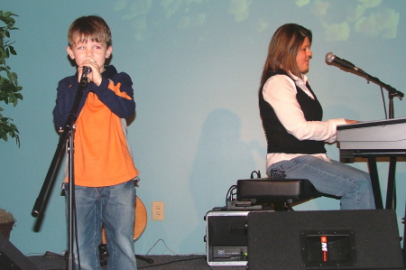 Mason singing with me at a concert