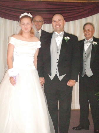 my brother his wife our dad and the precher in back