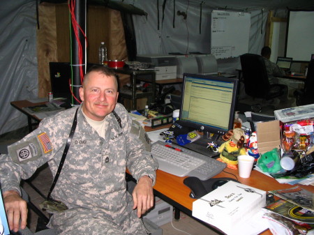My husband Ben at his desk in Iraq