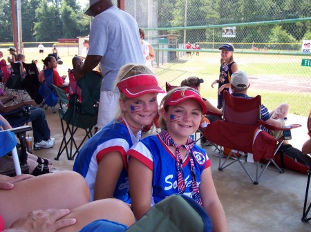 Paige and a friend at a softball tournament.