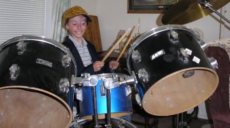 Grandson playing the drums