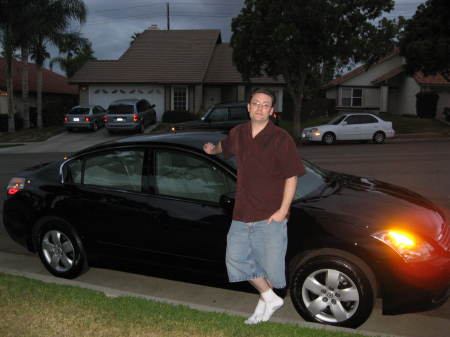 My son and his new car.  May 2008