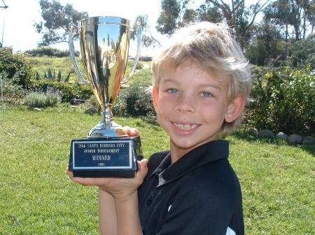 My son Jack in our backyard after winning a big tennis tournament