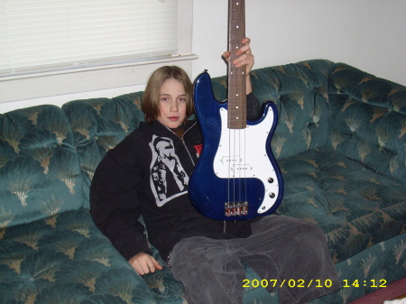 Stepson Aaron and his new guitar