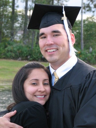 My college Grad with his girl