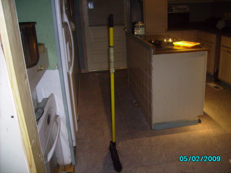 broom standing on its own in 09