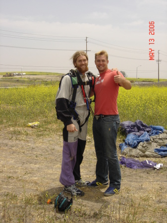 Chaz and instructor after his first skydiving experience.