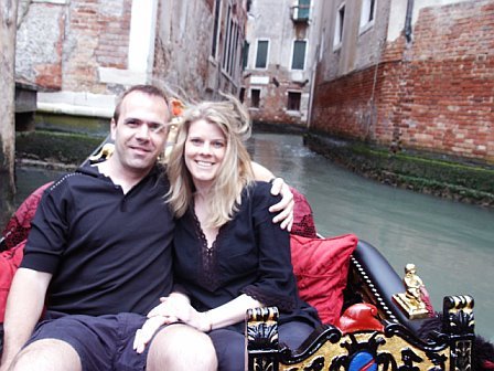 Taking a gondola ride in Venice