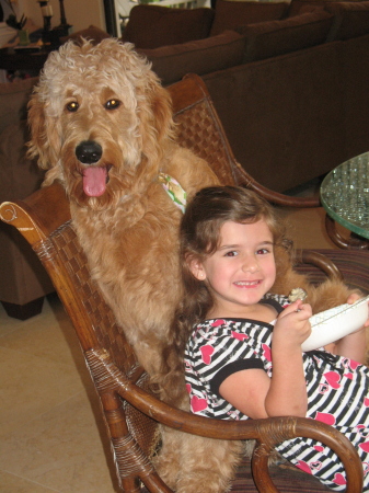 Anna and our 8 month old Goldendoodle DJ