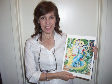 Jody Spence holding indian painting