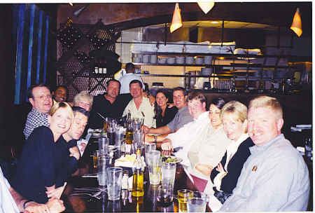 Rocco breaking bread with friends and colleagues at Miss USA 2003 in San Antonio, Texas