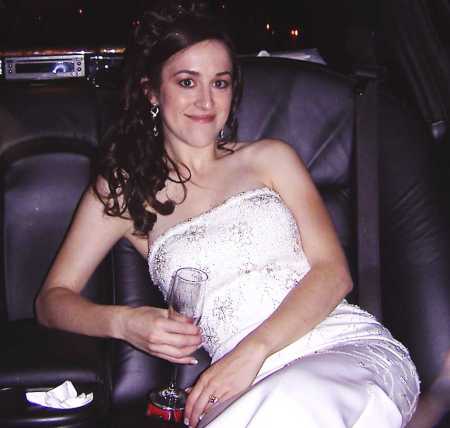 wife in limo smiling