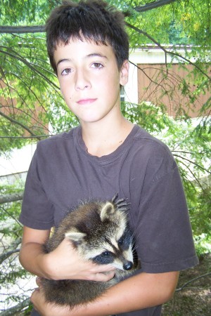AJ and our pet racoon Rocky