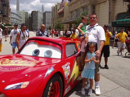 My husband and kids with Lightening McQueen at Disney 7/06